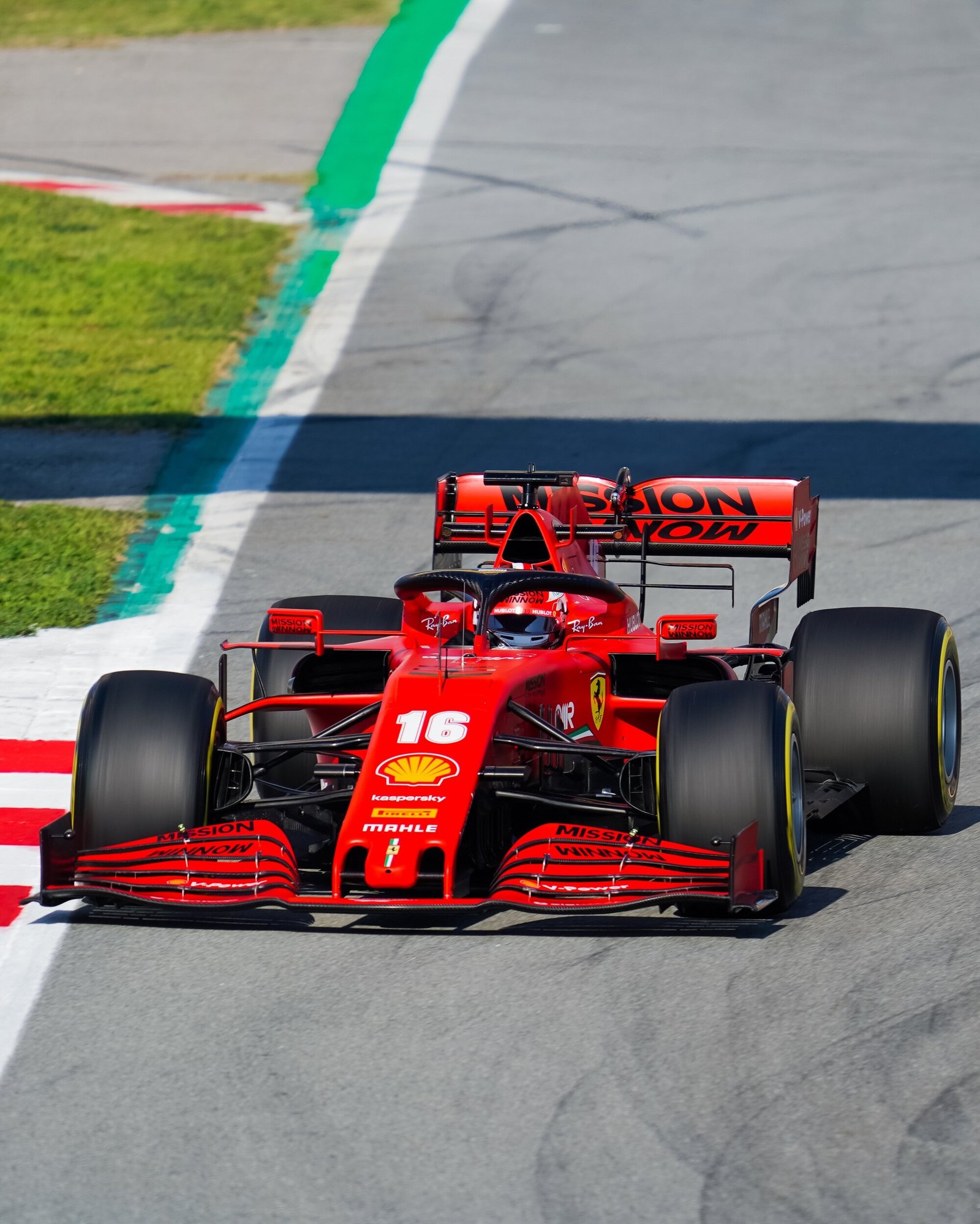 Ferrari SF1000 number 16 on track beside the green and white kerbs, Formula 1 pre-season testing, Barcelona 2020
