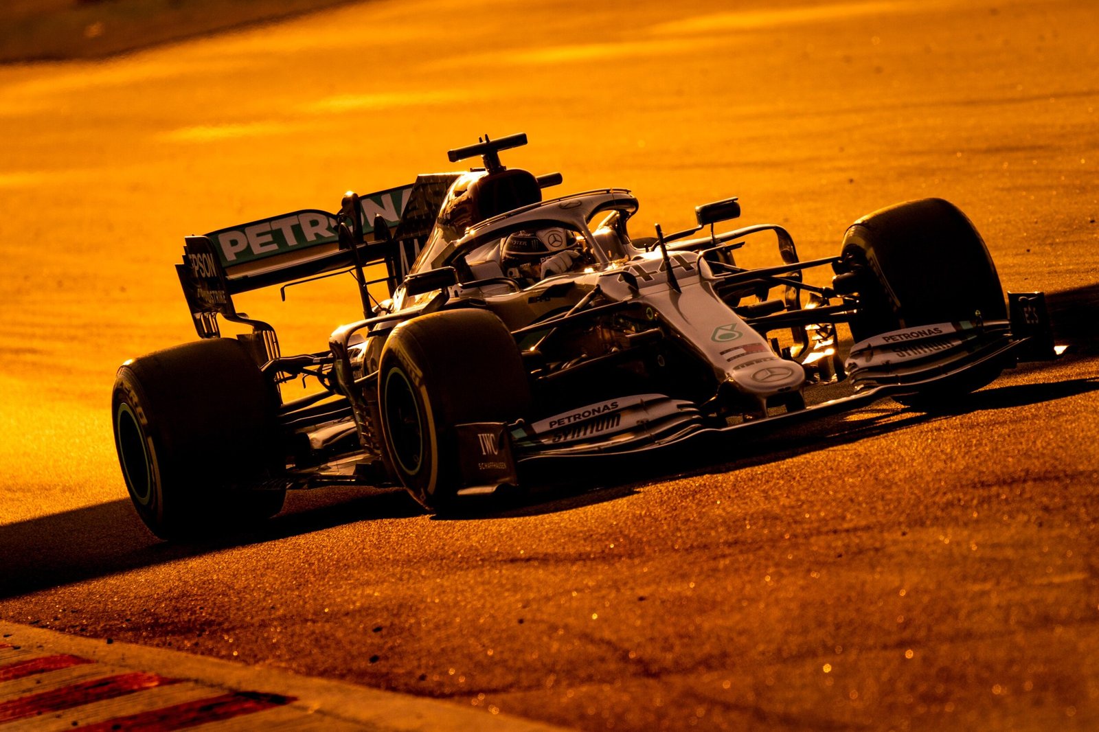 Mercedes W11 backlit at sunset on the main straight, Formula 1 pre-season testing, Circuit de Barcelona-Catalunya 2020