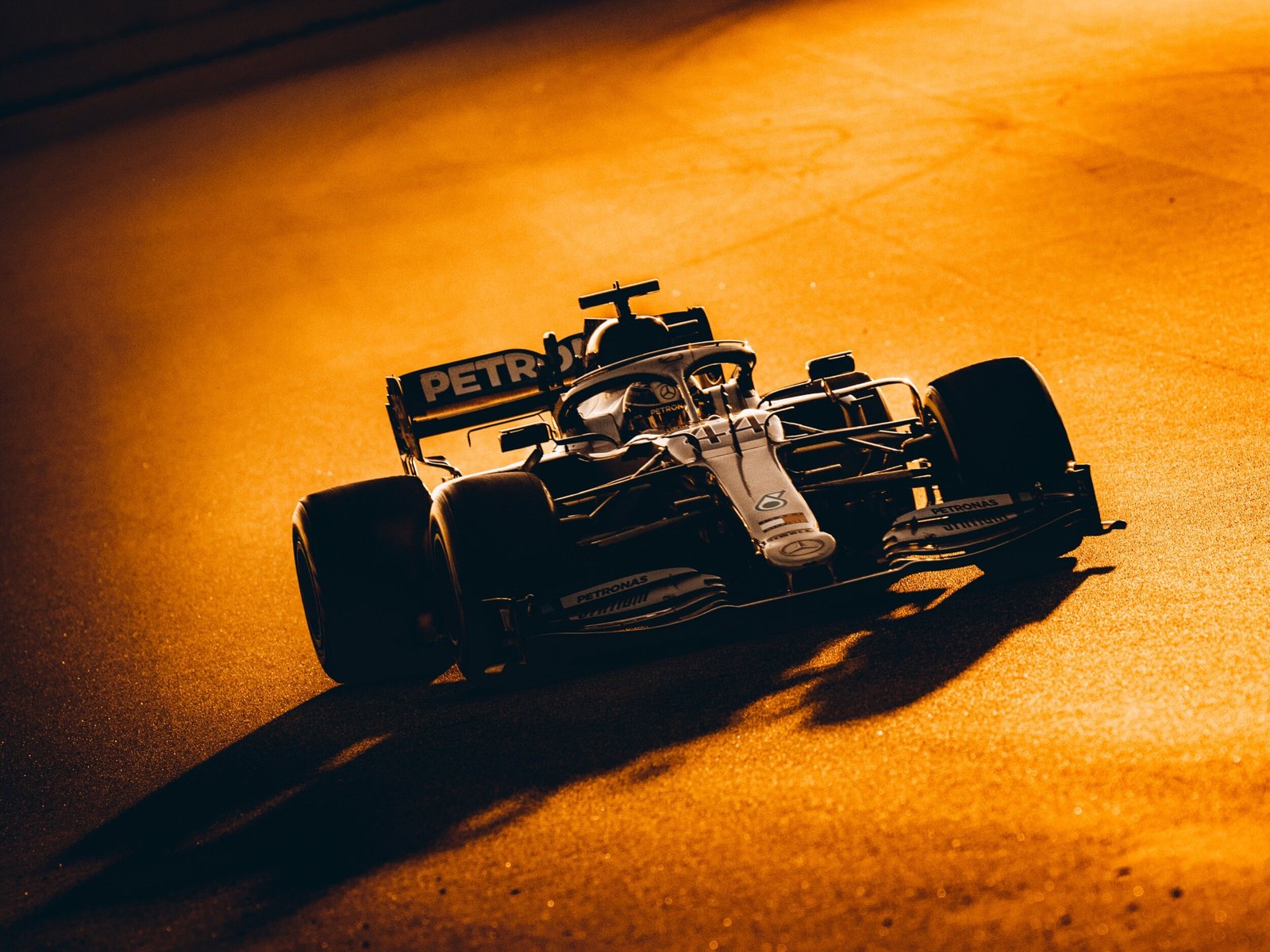 Mercedes W11 number 44 on track in low golden light at Formula 1 pre-season testing, Barcelona 2020
