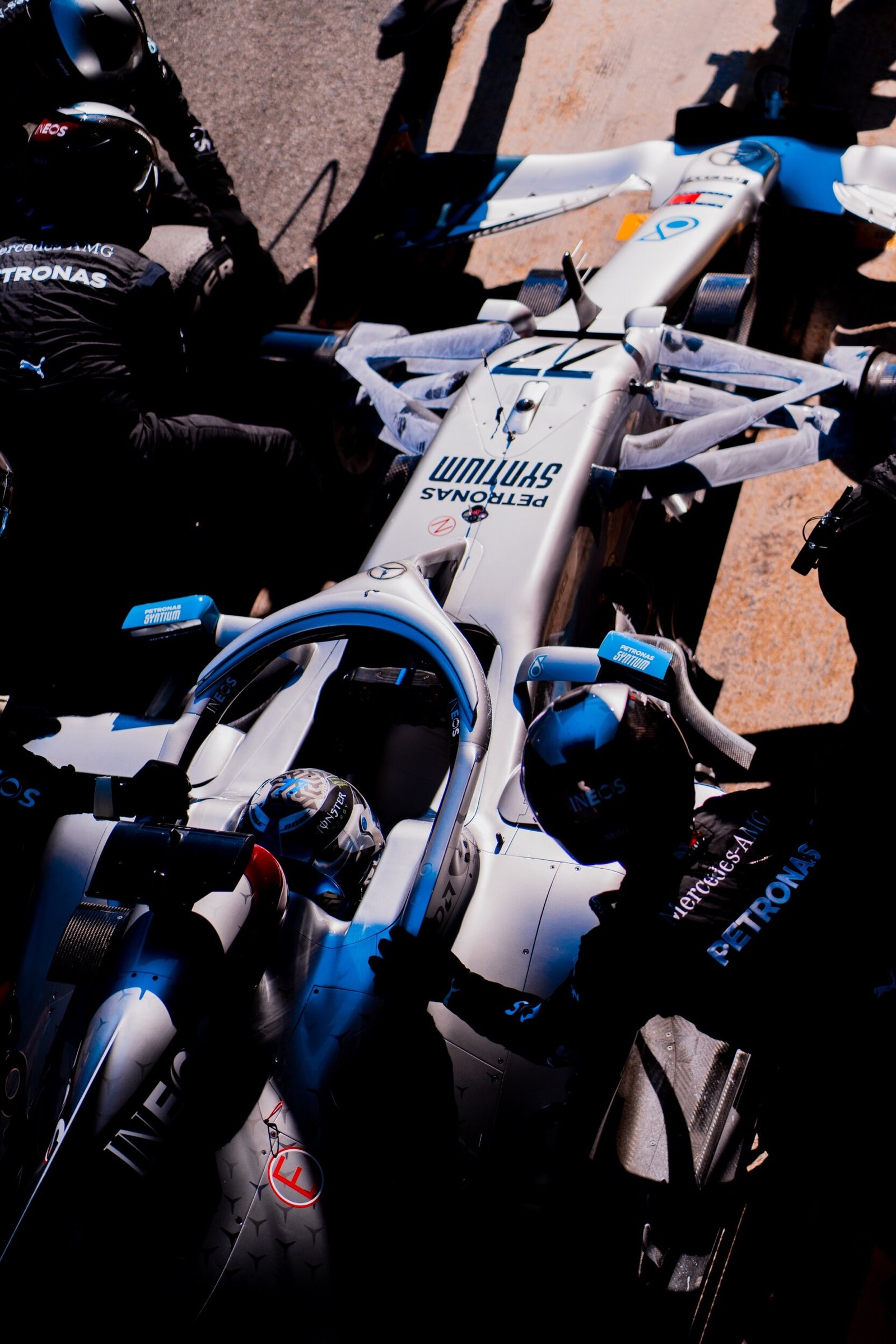 Overhead view of the Mercedes W11 number 77 surrounded by its pit crew in the pit lane, Formula 1 pre-season testing, Barcelona 2020