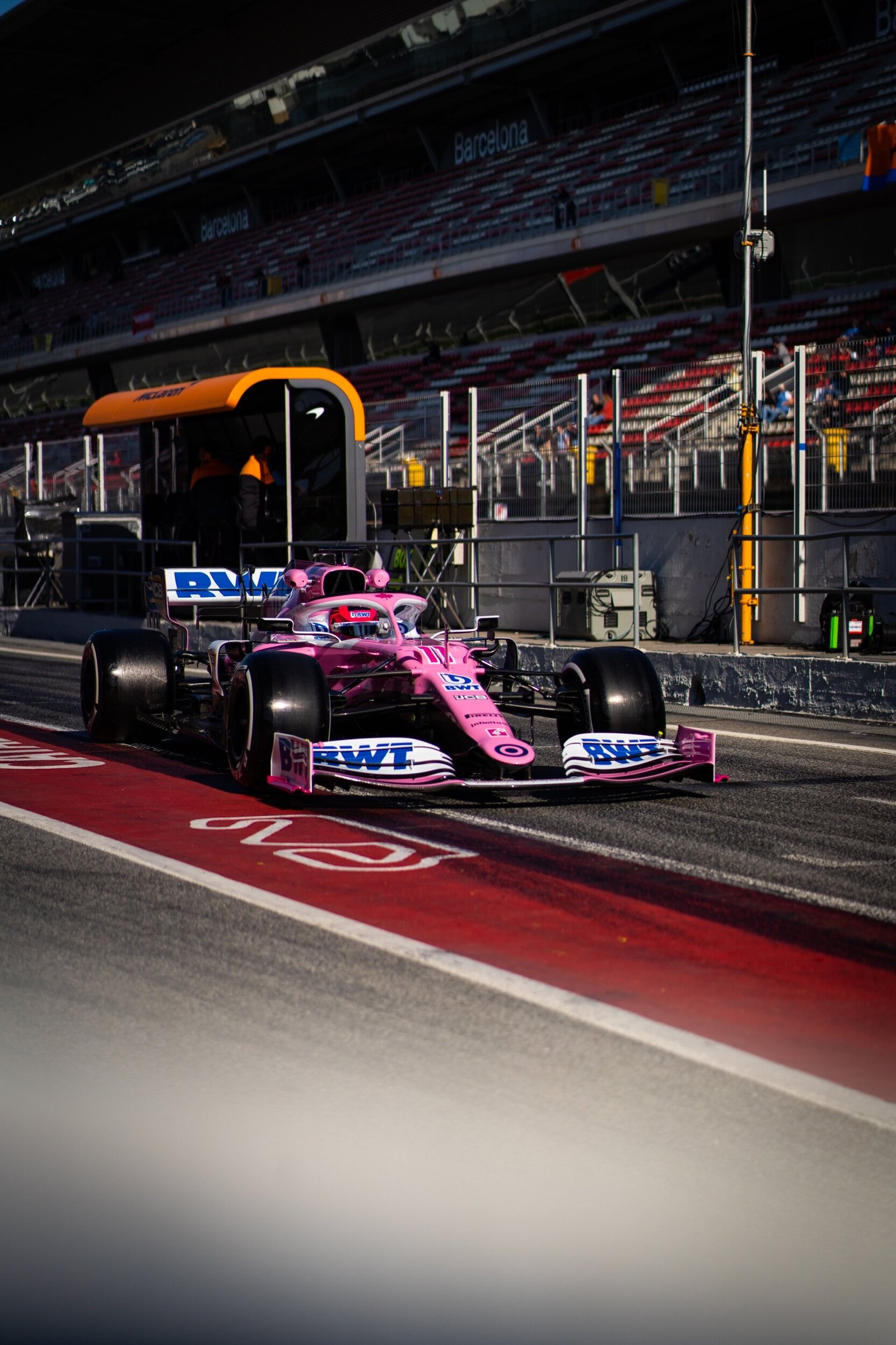 Racing Point RP20 in the pit lane in front of the Barcelona grandstand, Formula 1 pre-season testing 2020